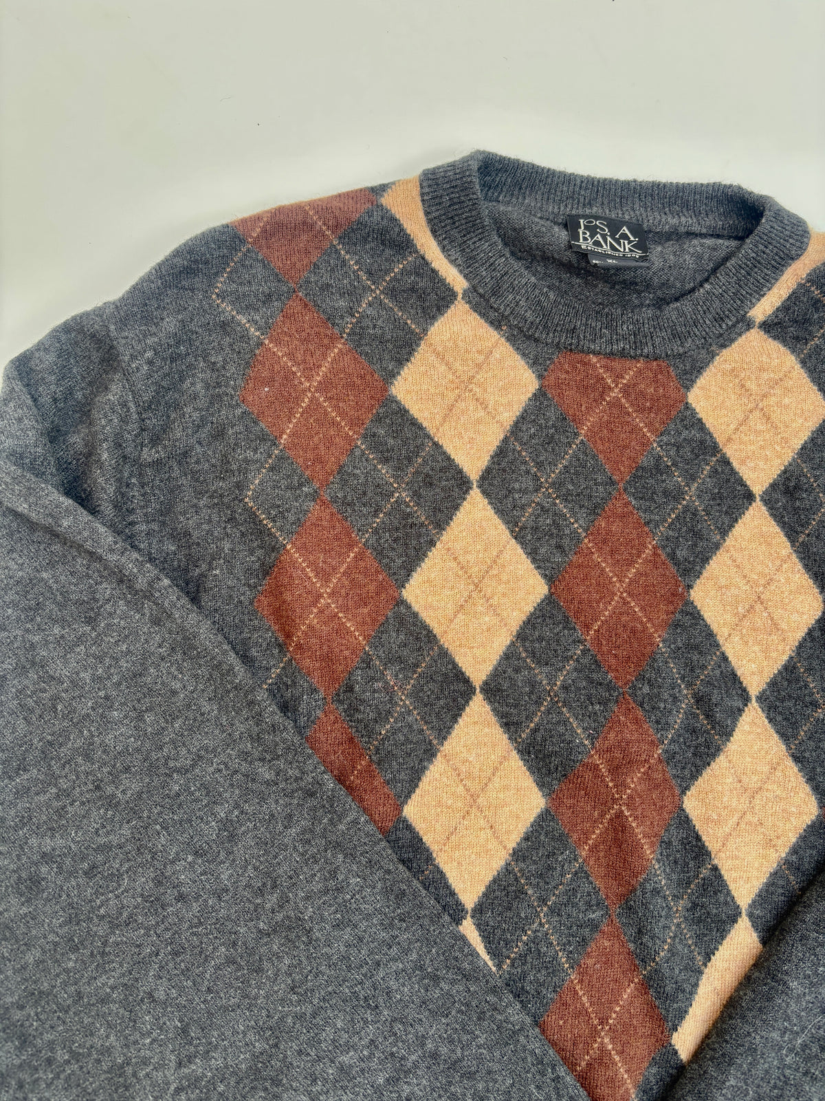 Sweater Joe A bank rombos café