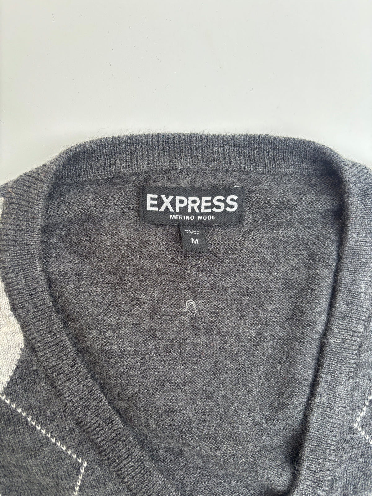 Sweater Express lana gris